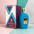 Esta Puro Volaré – Eau de Parfum Mixte 100ml, flacon bleu avec bouchon doré et coffret violet